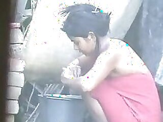 Beautiful woman of desi origin takes a bath in a hidden camera video